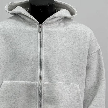 Gray hoodie on a mannequin against a gray background