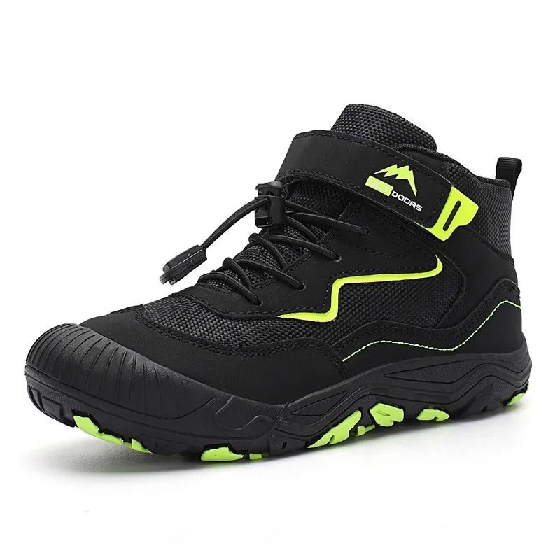 Black hiking boot with green accents on a white background
