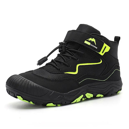 Black hiking boot with green accents on a white background