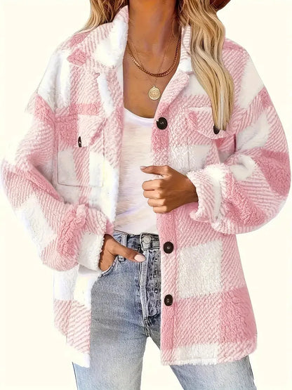Pink and white checkered jacket worn by a person on a white background