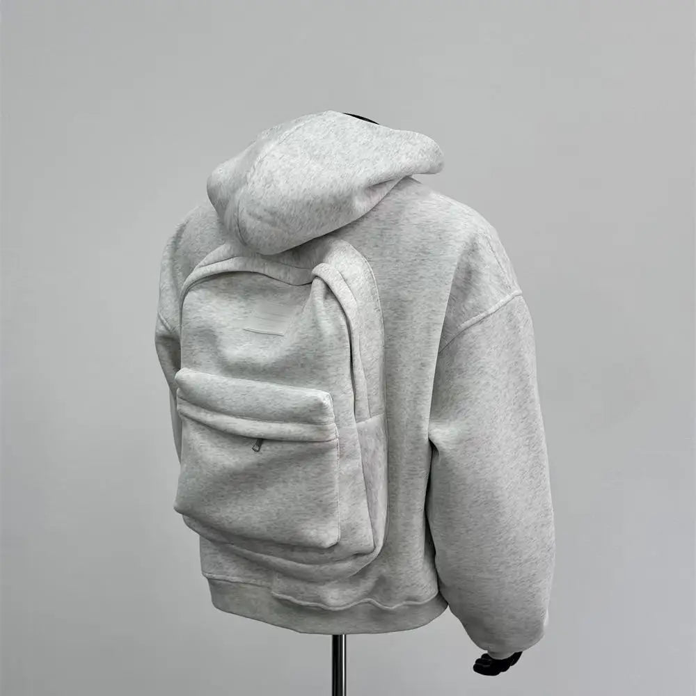 Gray hoodie on a mannequin against a gray background