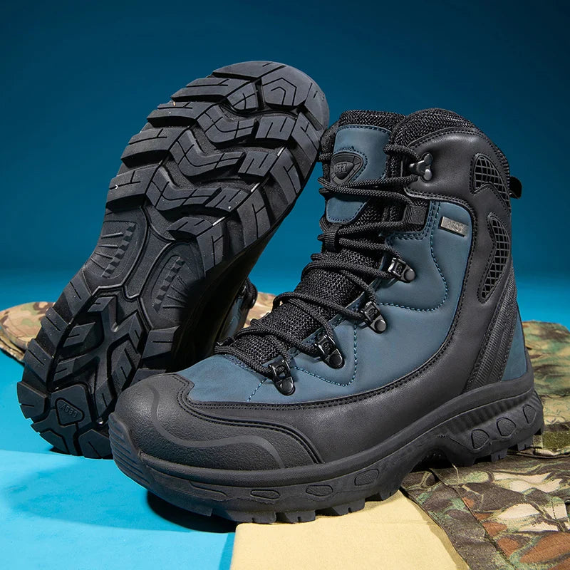 Pair of blue tactical boots with black soles on a camouflage-patterned surface.