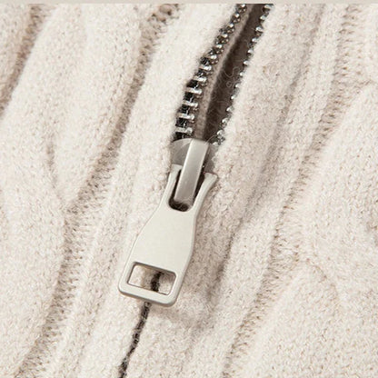 Close-up of a zipper on a textured beige fabric background