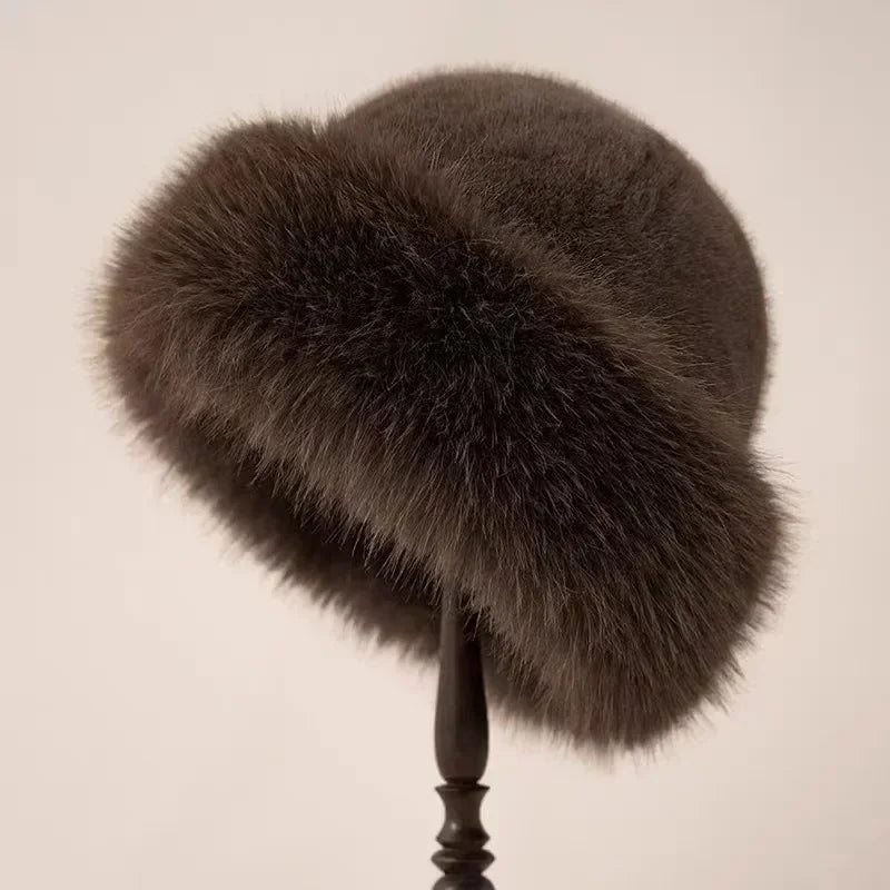 Brown fur hat on a beige background