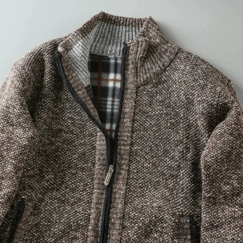 Brown textured jacket with plaid lining on a light gray background