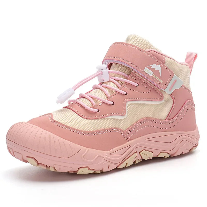 Pink and beige sneaker with a visible brand logo on a white background