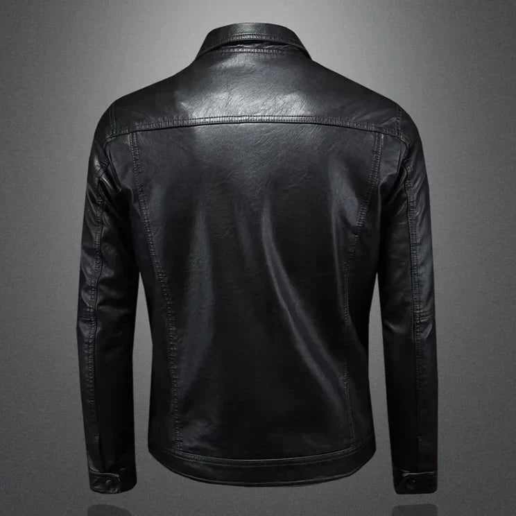 Black leather jacket on a gray background