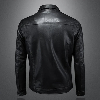 Black leather jacket on a gray background