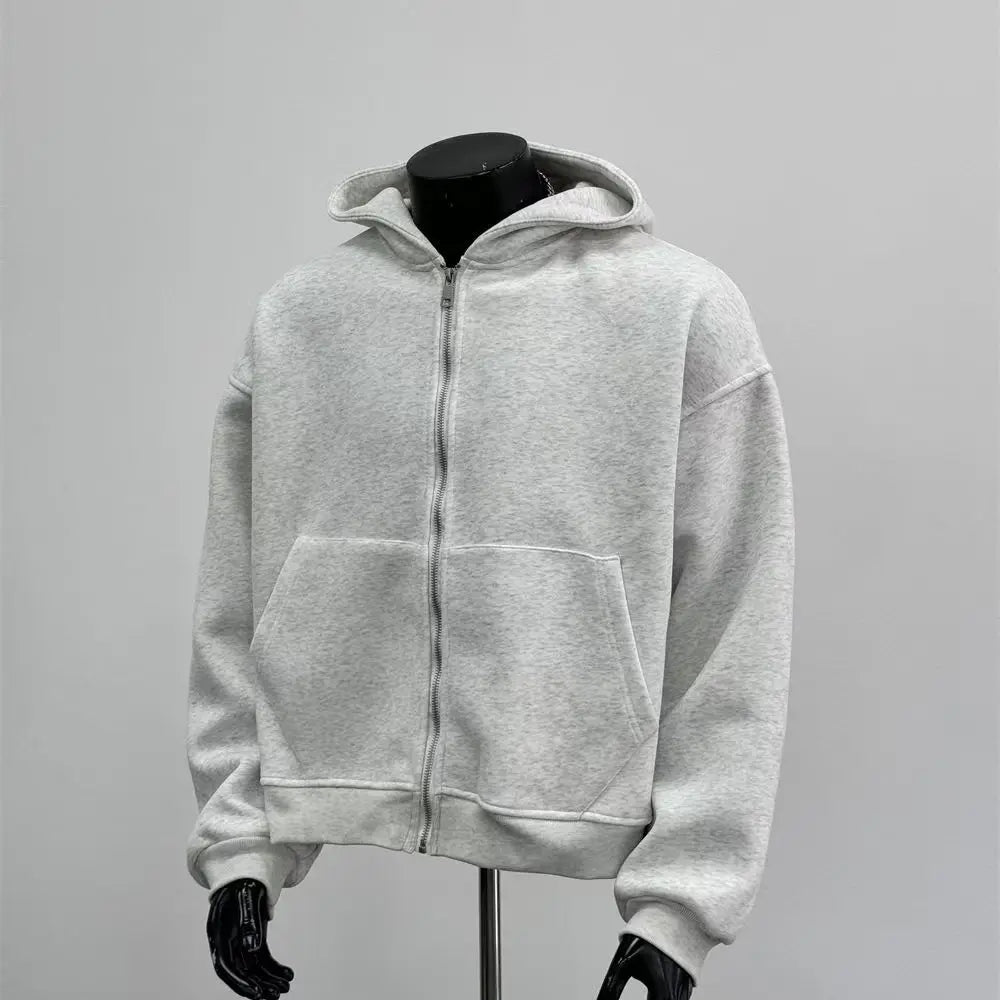 Gray hoodie on a mannequin against a gray background