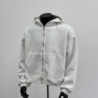 Gray hoodie on a mannequin against a gray background