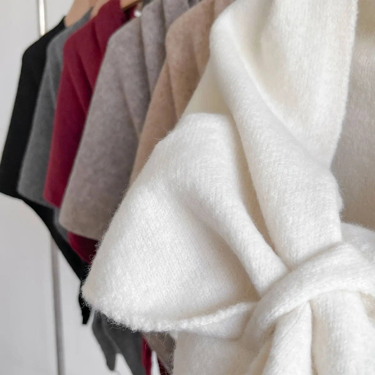 Close-up of a white textured fabric with a blurred background