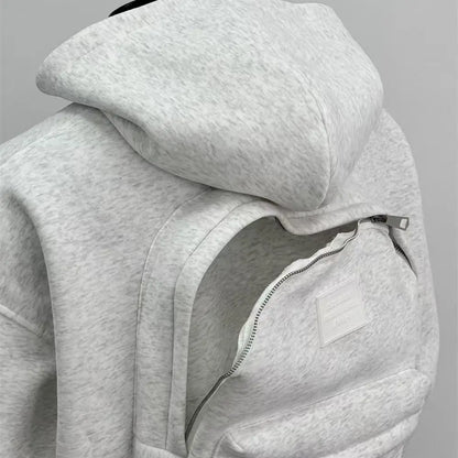 Gray hoodie with a zipper on a gray background