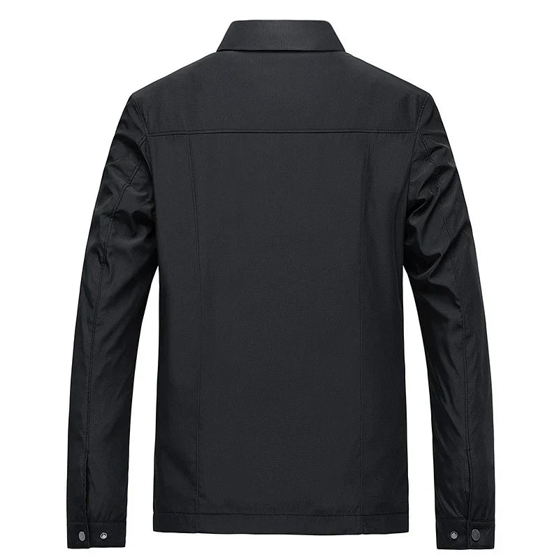 Black jacket shown from the back on a white background