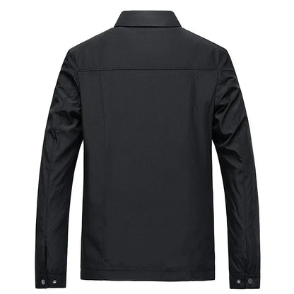 Black jacket shown from the back on a white background