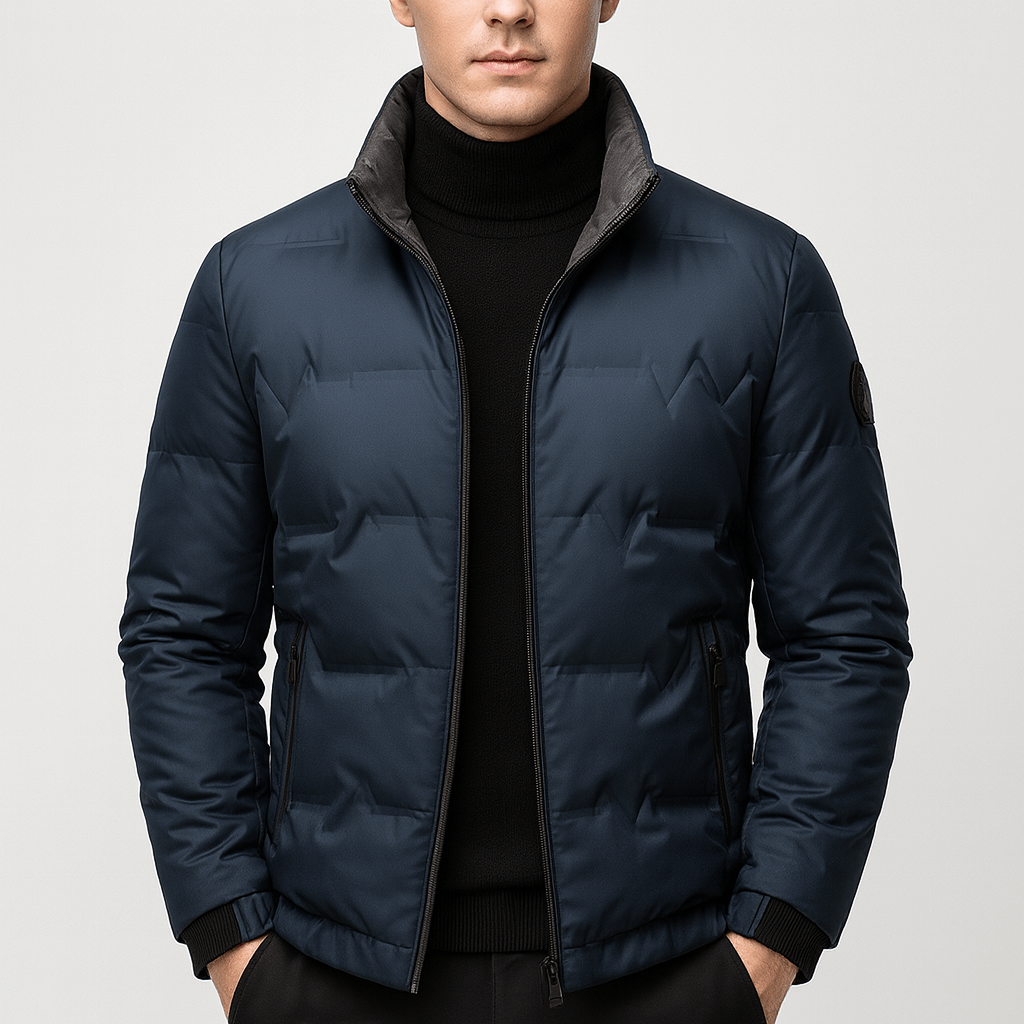 Man wearing a navy blue puffer jacket on a light gray background