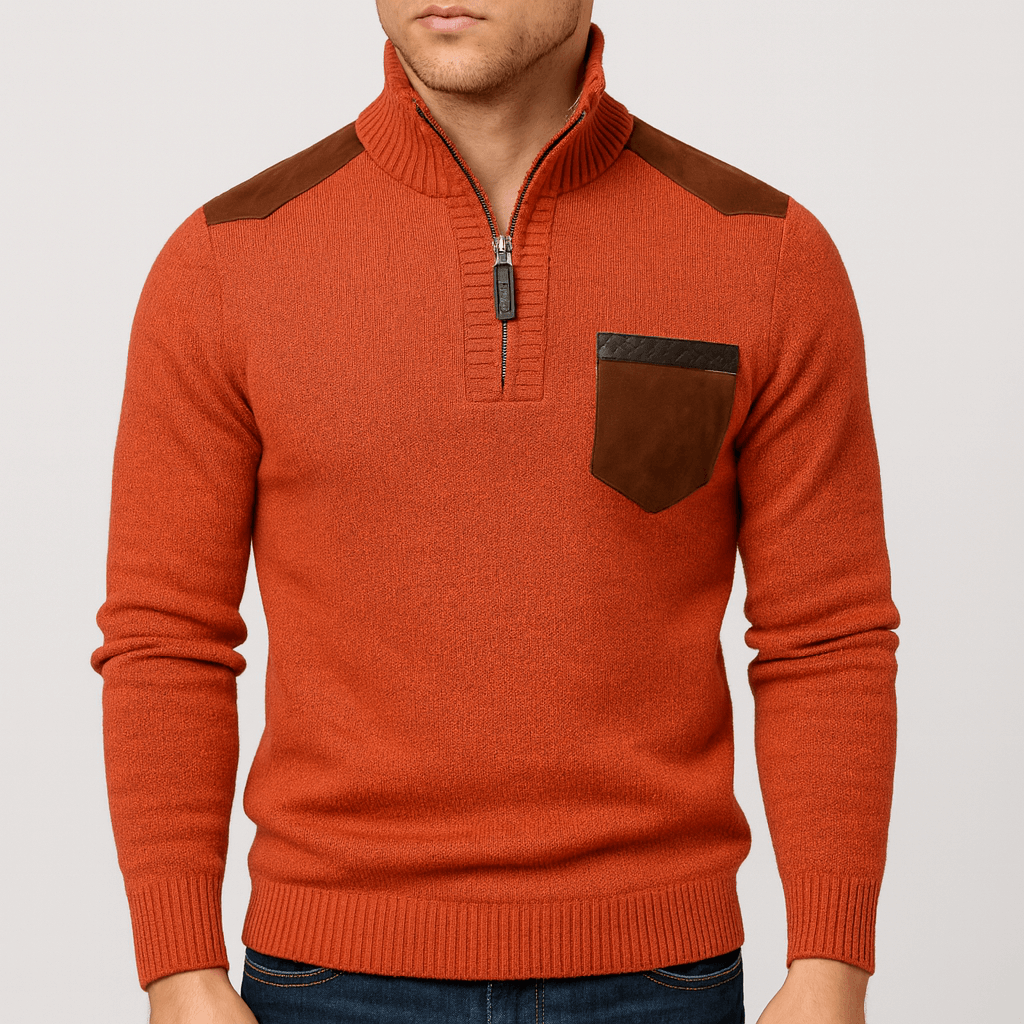 Orange sweater with brown accents on a plain background