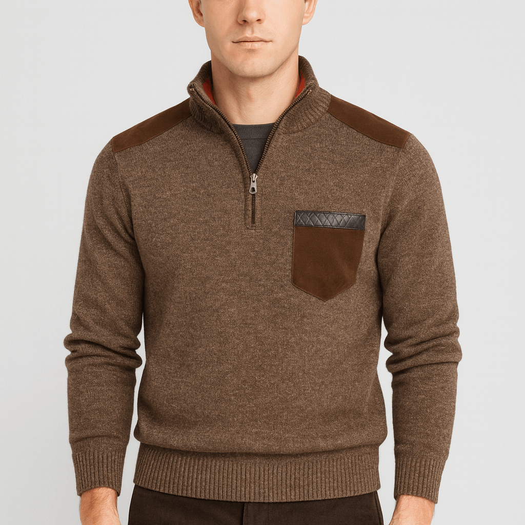 Man wearing a brown sweater with a pocket on a light gray background