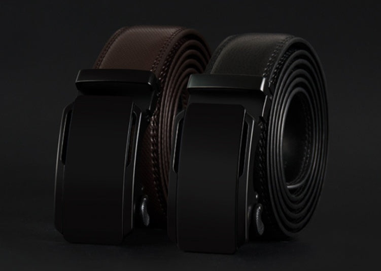 Two black leather belts with a buckle on a dark background