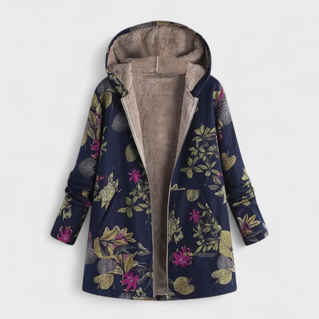 Floral patterned coat with brown lining on a white background