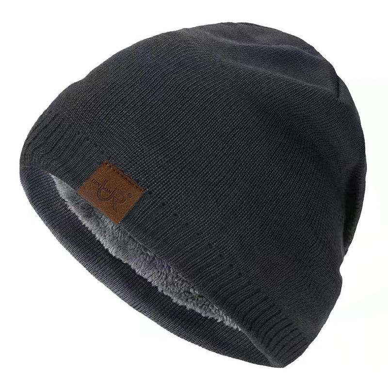 Dark gray beanie with a brown leather patch on a white background