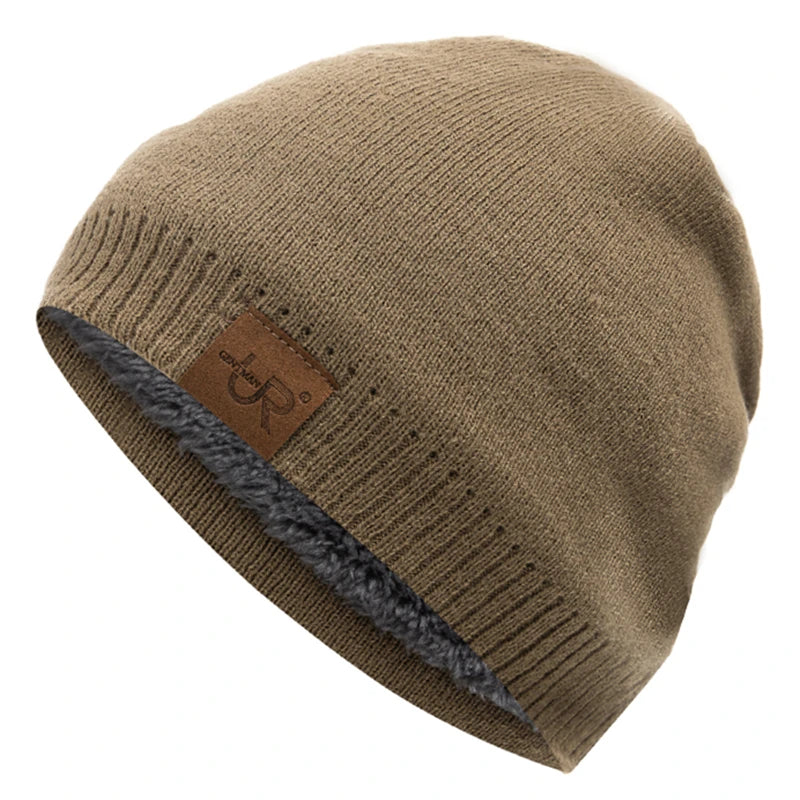 Brown knit beanie with a leather patch on a white background
