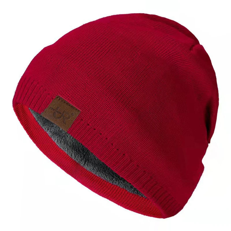 Red beanie with a brown leather patch on a white background