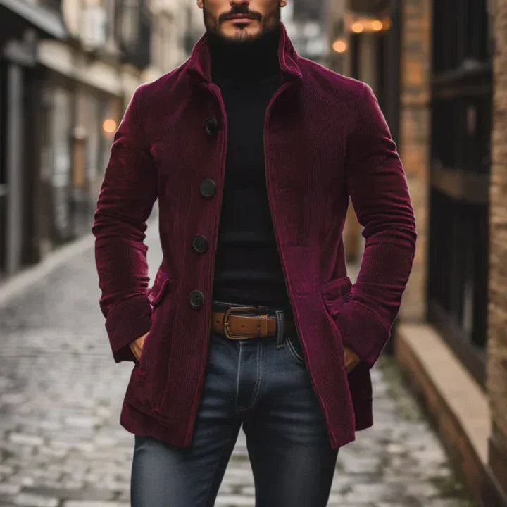 Man wearing a purple coat in an urban setting
