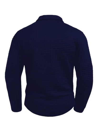 Navy blue textured sweater on a white background