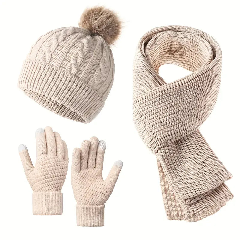 Beige knit hat with pom-pom, scarf, and gloves set on a white background