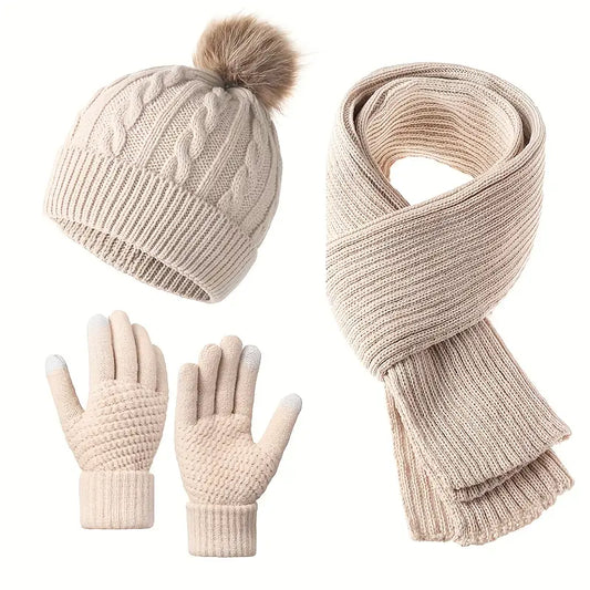 Beige knit hat with pom-pom, scarf, and gloves set on a white background