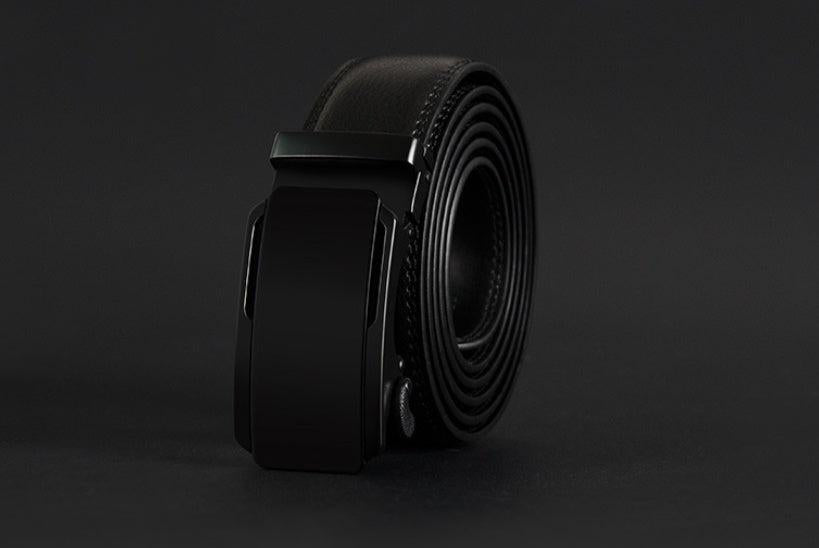 Black leather belt with a buckle on a dark background