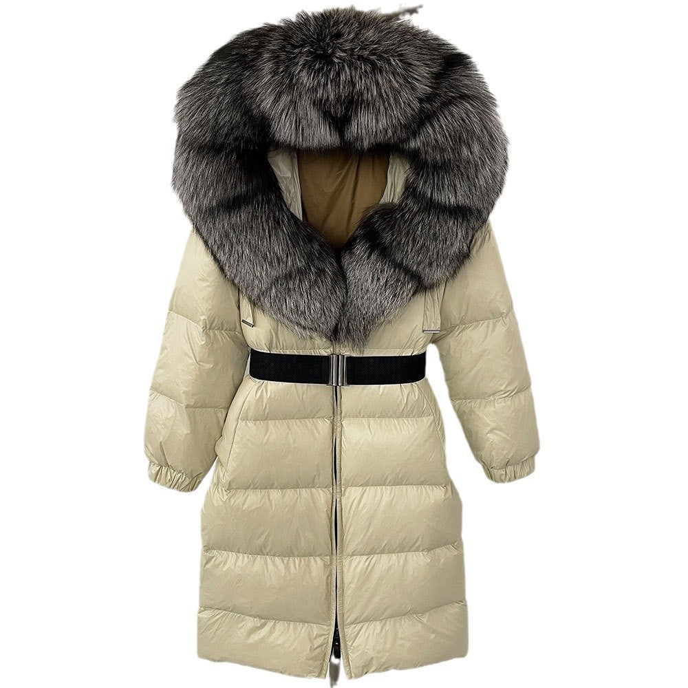 Beige puffer coat with a large fur hood on a white background