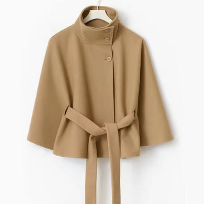 Beige coat with a belt on a white background