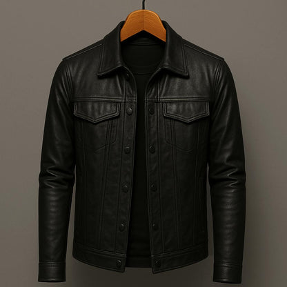 Black leather jacket on a hanger against a gray background