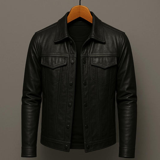 Black leather jacket on a hanger against a gray background