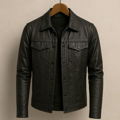 Black leather jacket on a hanger against a beige background