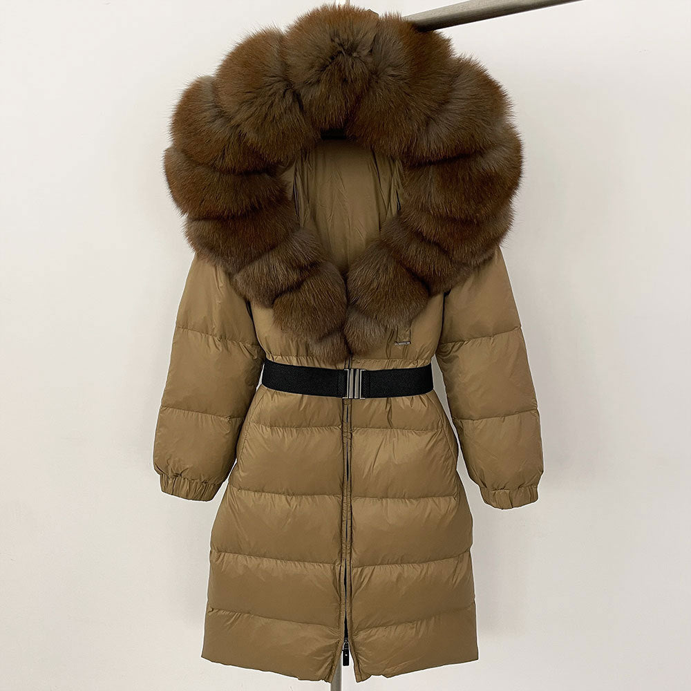 Beige puffer coat with brown fur hood on a white background