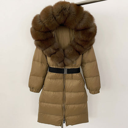 Beige puffer coat with brown fur hood on a white background