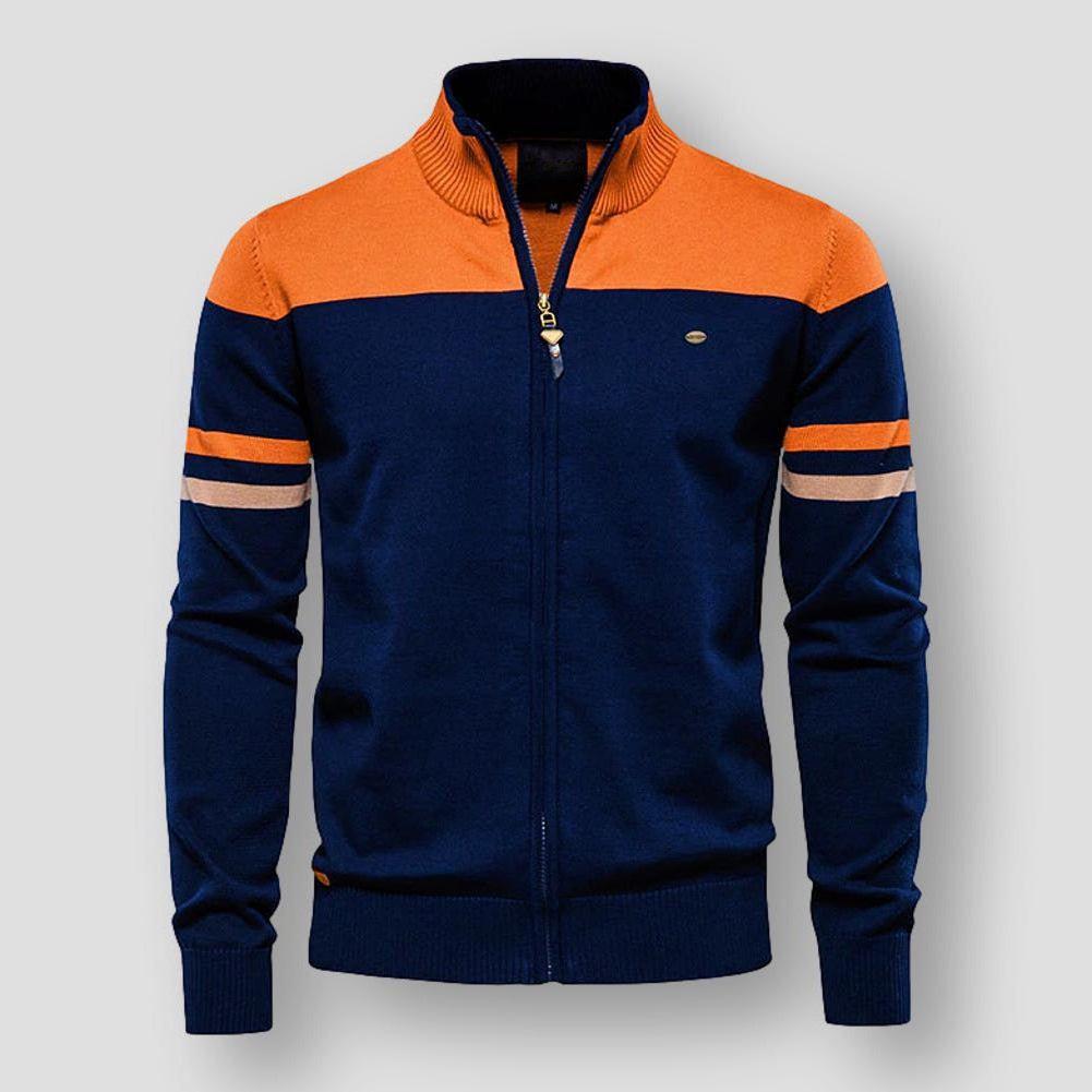 Blue and orange jacket with striped sleeves on a gray background