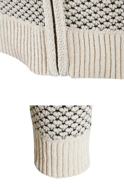 Close-up of a textured fabric with a patterned border on a white background