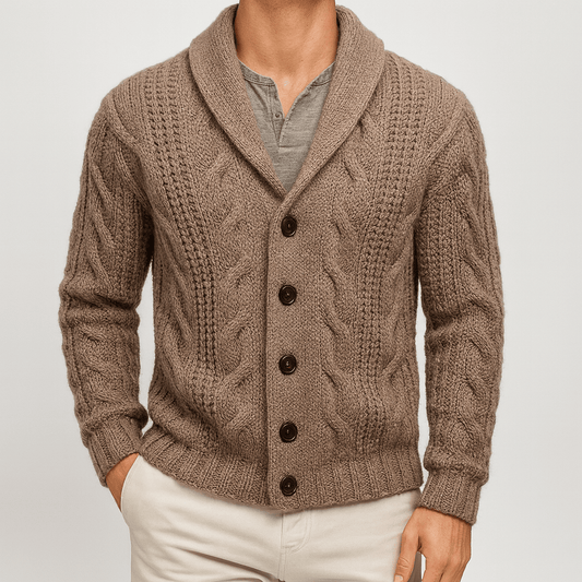 Brown knitted cardigan worn by a person on a light gray background