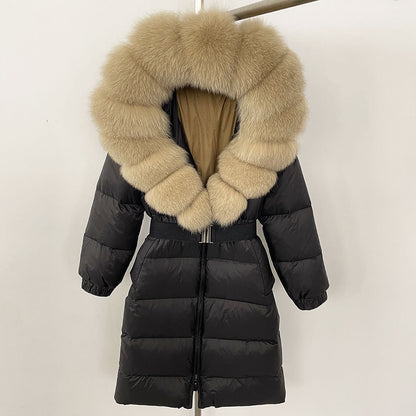 Black puffer coat with beige fur hood on a white background