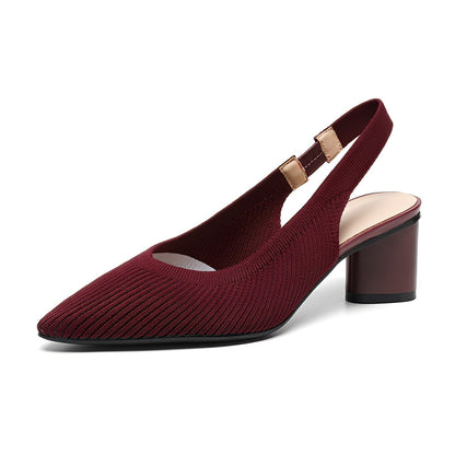 Maroon high-heeled shoe on a white background