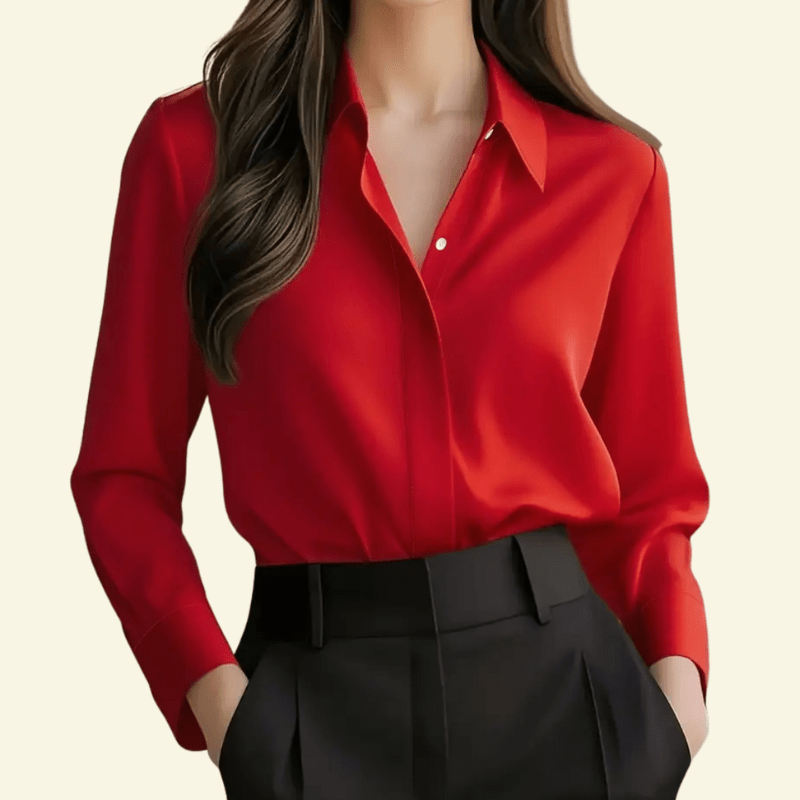 Red shirt worn by a person on a beige background