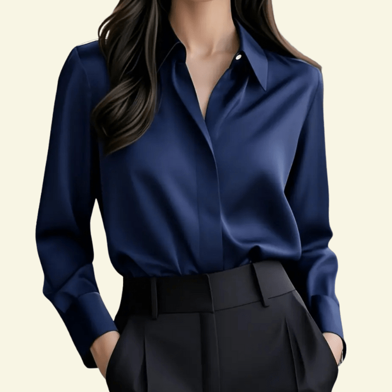 Navy blue shirt worn by a person on a beige background