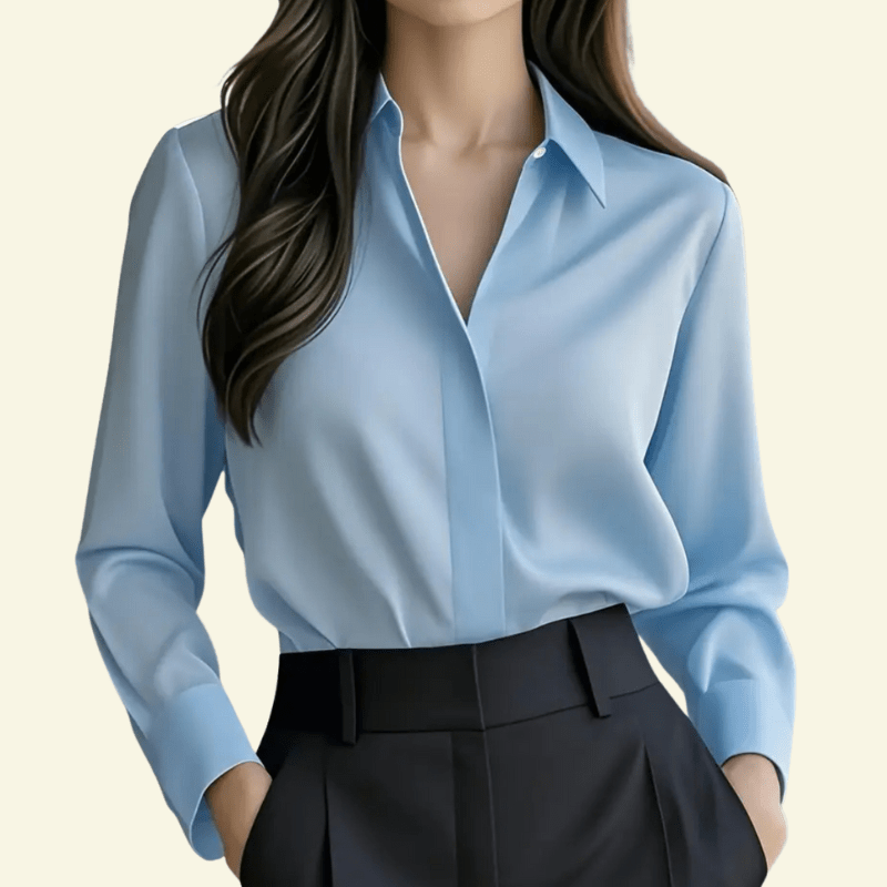 Light blue shirt worn by a person on a beige background