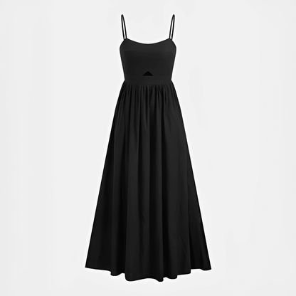 Black dress with thin straps on a light gray background