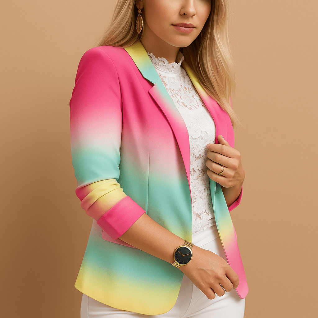 Woman wearing a colorful gradient blazer against a beige background