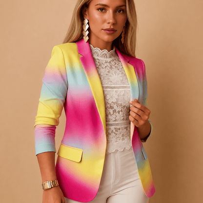 Woman wearing a colorful blazer with a beige background