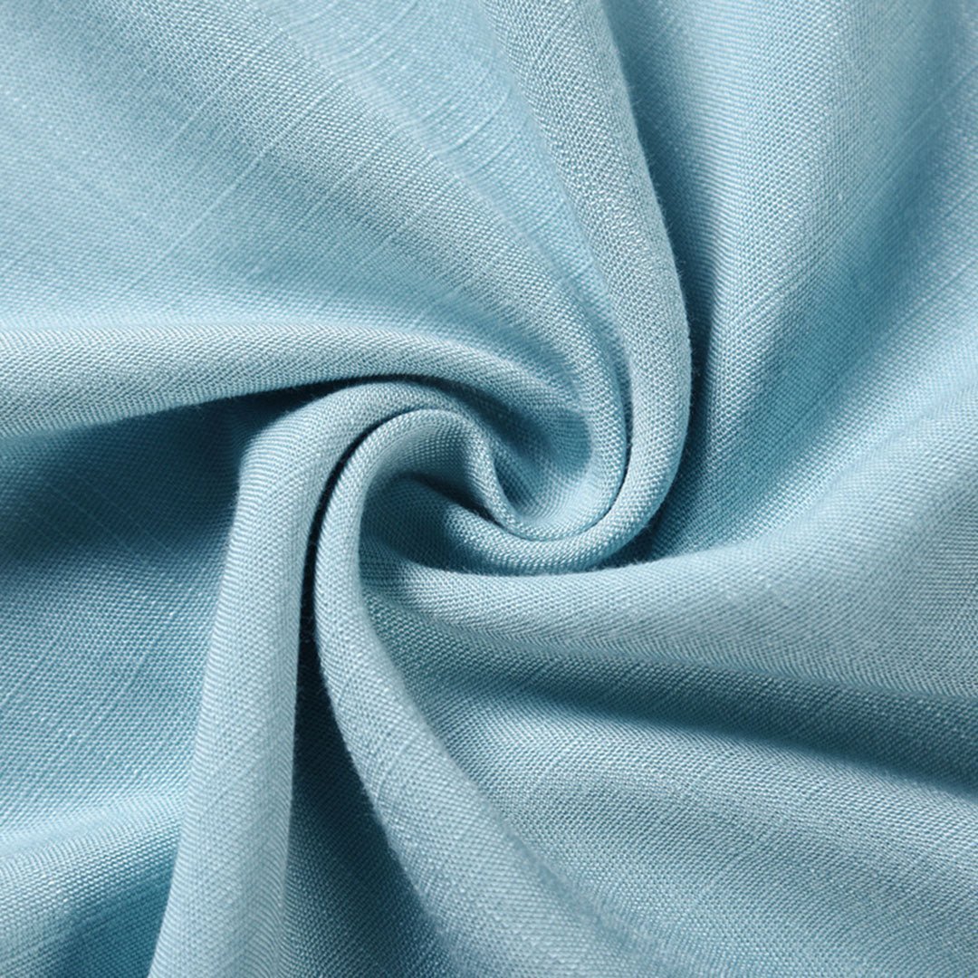 Close-up of light blue fabric with a subtle texture